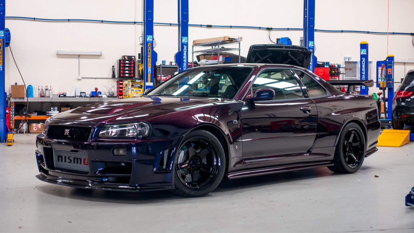 NISSAN SKYLINE GT-R (R34) ZTUNE MIDNIGHT PURPLE 1999 - Solido - 1/43
